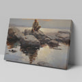 Framed canvas print of serene seascape with man sitting on rocks at sunset