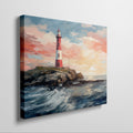 Framed canvas print of a vibrant sunset seascape with a red and white lighthouse on a cliff