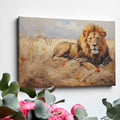 Framed canvas print of a realistic lion lying in the grass of the African savanna, with warm golden tones