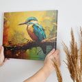 Framed canvas print of a vibrant, colourful impressionistic kingfisher perched on a branch