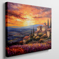 Framed canvas print of an Impressionist Tuscan landscape with a vibrant sunset sky, overlooking lavender fields and rustic houses.