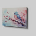 Framed canvas print of a vibrant bluebird on cherry blossom branch in watercolor