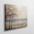 Framed canvas print of misty autumnal river scene with leafless trees and bird in flight