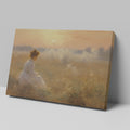 Framed canvas print of a woman in a white dress gazing at a misty sunrise over a golden field