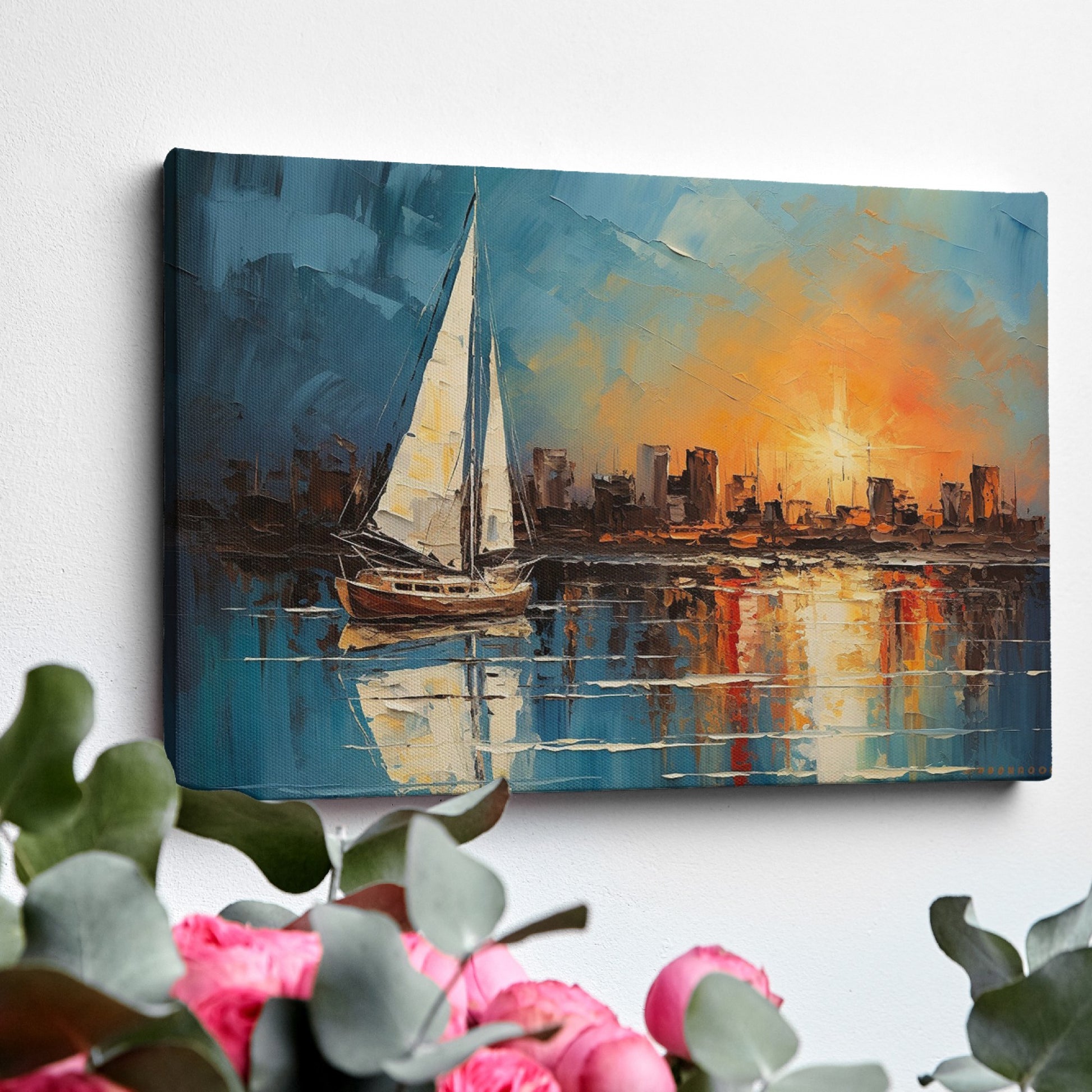 Framed canvas print of an impressionist painting with a sailboat against a sunset cityscape reflecting on the water