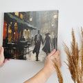 Framed canvas print of a romantic couple on a rainy evening stroll in a vintage style cityscape