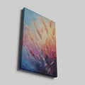 Framed canvas print of abstract pampas grass in sunset colours against a blue sky