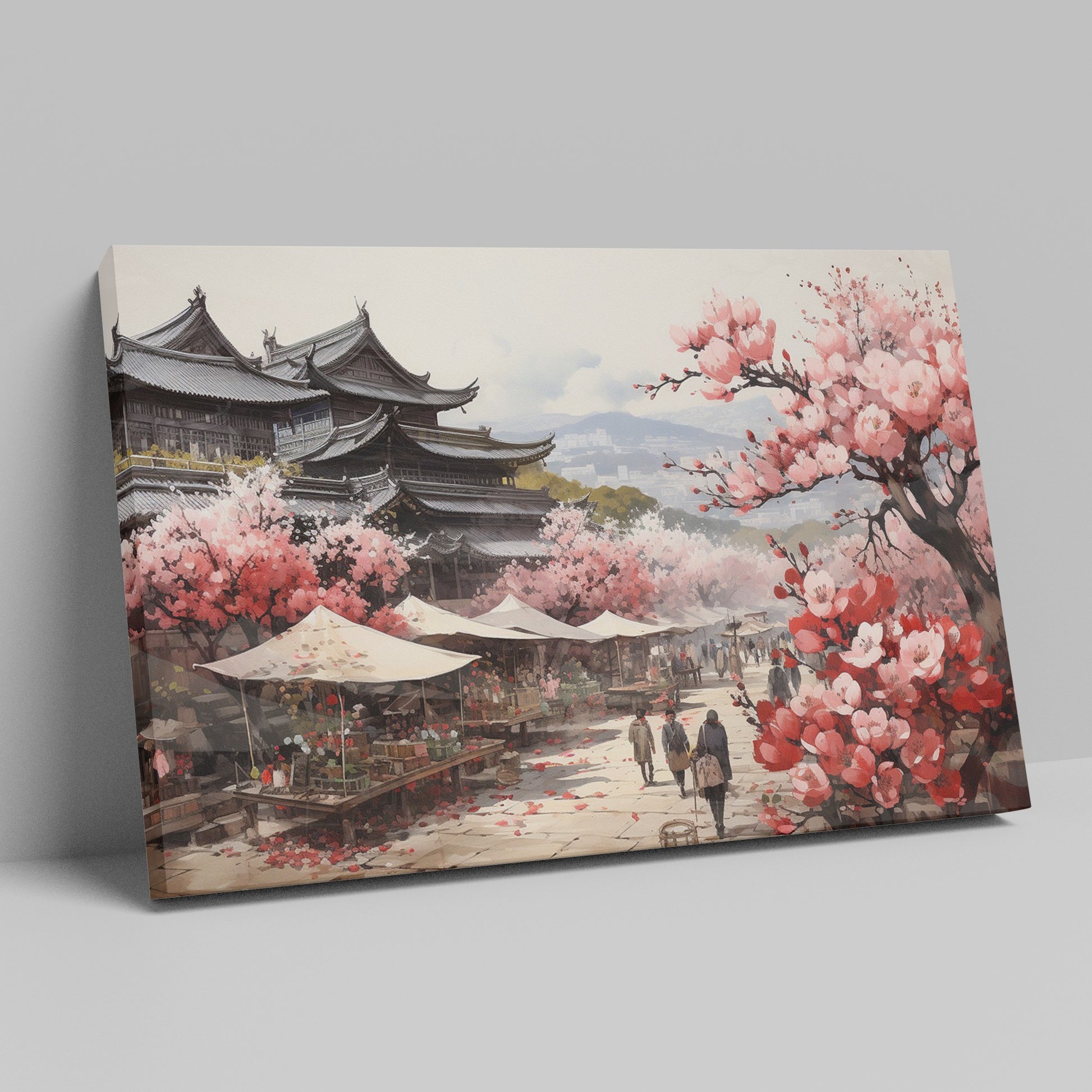 Framed canvas print of a traditional Japanese town during cherry blossom season with pink florals and historic architecture