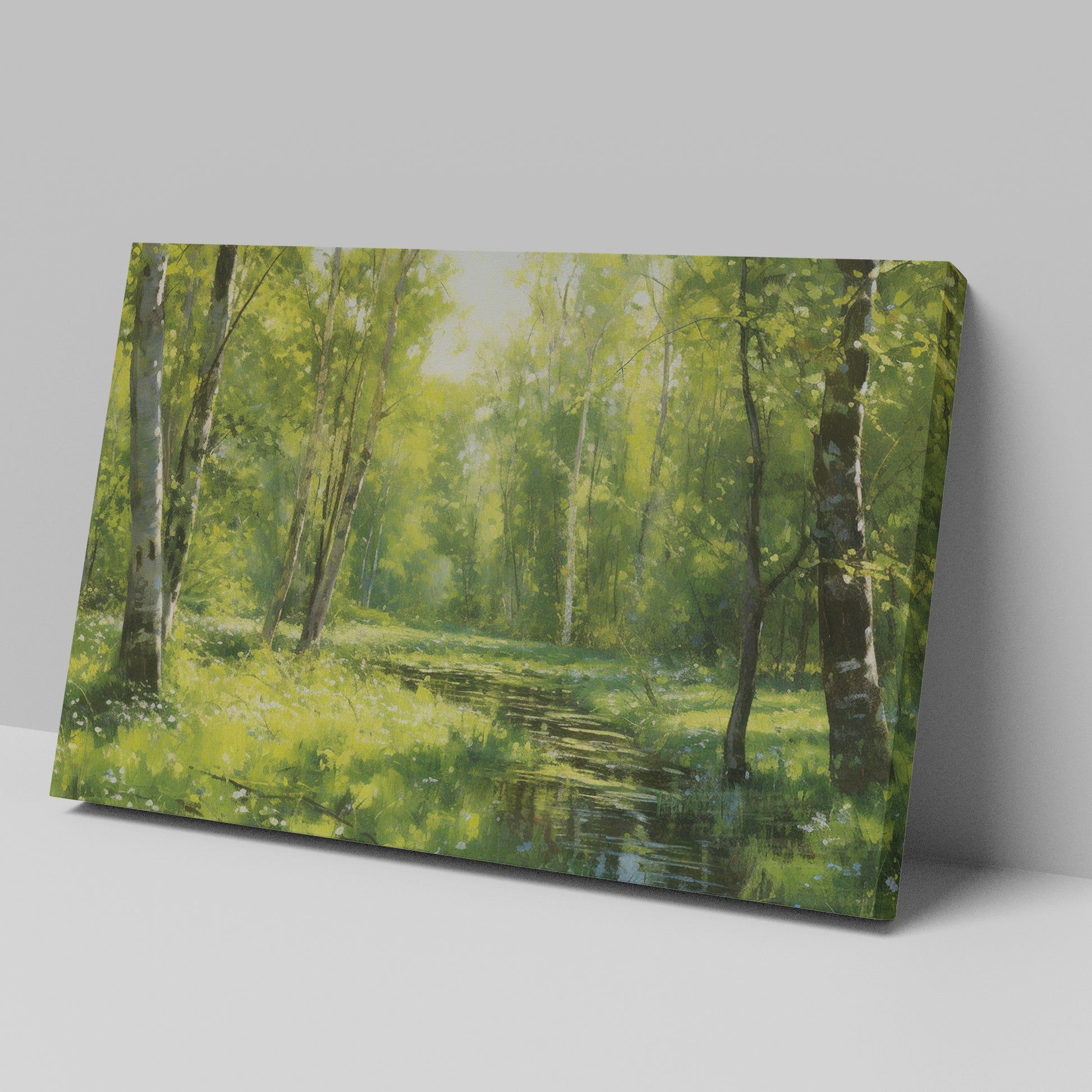 Framed canvas print of a lush forest scene with birch trees and a stream with sunlight filtering through green leaves