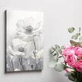 Framed canvas print of monochrome flowers with water droplets