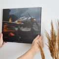 Framed canvas print of a vintage WWII fighter plane on a reflective rainy tarmac