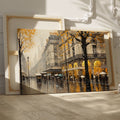 Framed canvas print of a Parisian streetscape with autumn leaves and rain