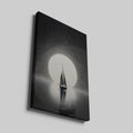 Framed canvas print of a sailboat silhouette against a large moon and starry sky in monochrome tones