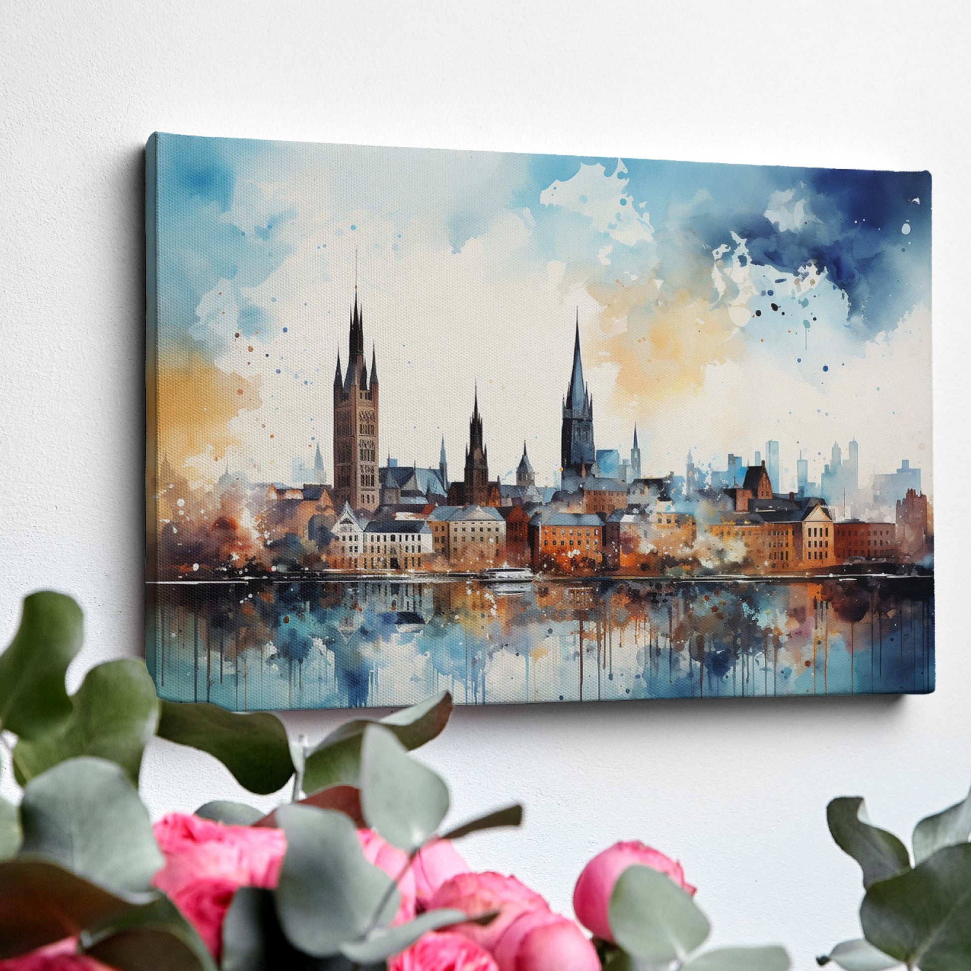 Framed canvas print of abstract watercolour cityscape with vibrant blue, orange and black tones