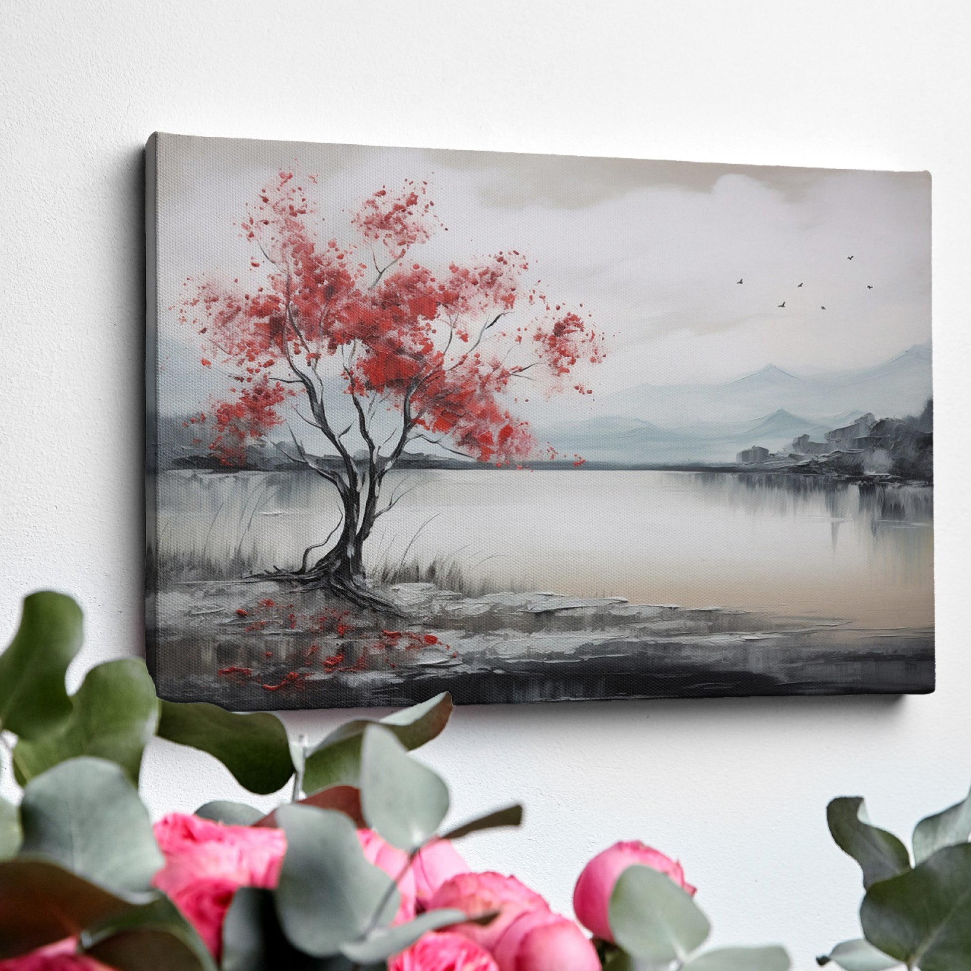 Framed canvas print of a serene landscape painting showcasing a vibrant red tree against a monochrome backdrop with flying birds