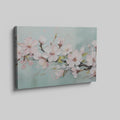 Framed canvas print of pastel cherry blossom flowers in impasto style