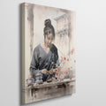 Framed canvas print of an elegant Asian woman with traditional clothing and cherry blossoms