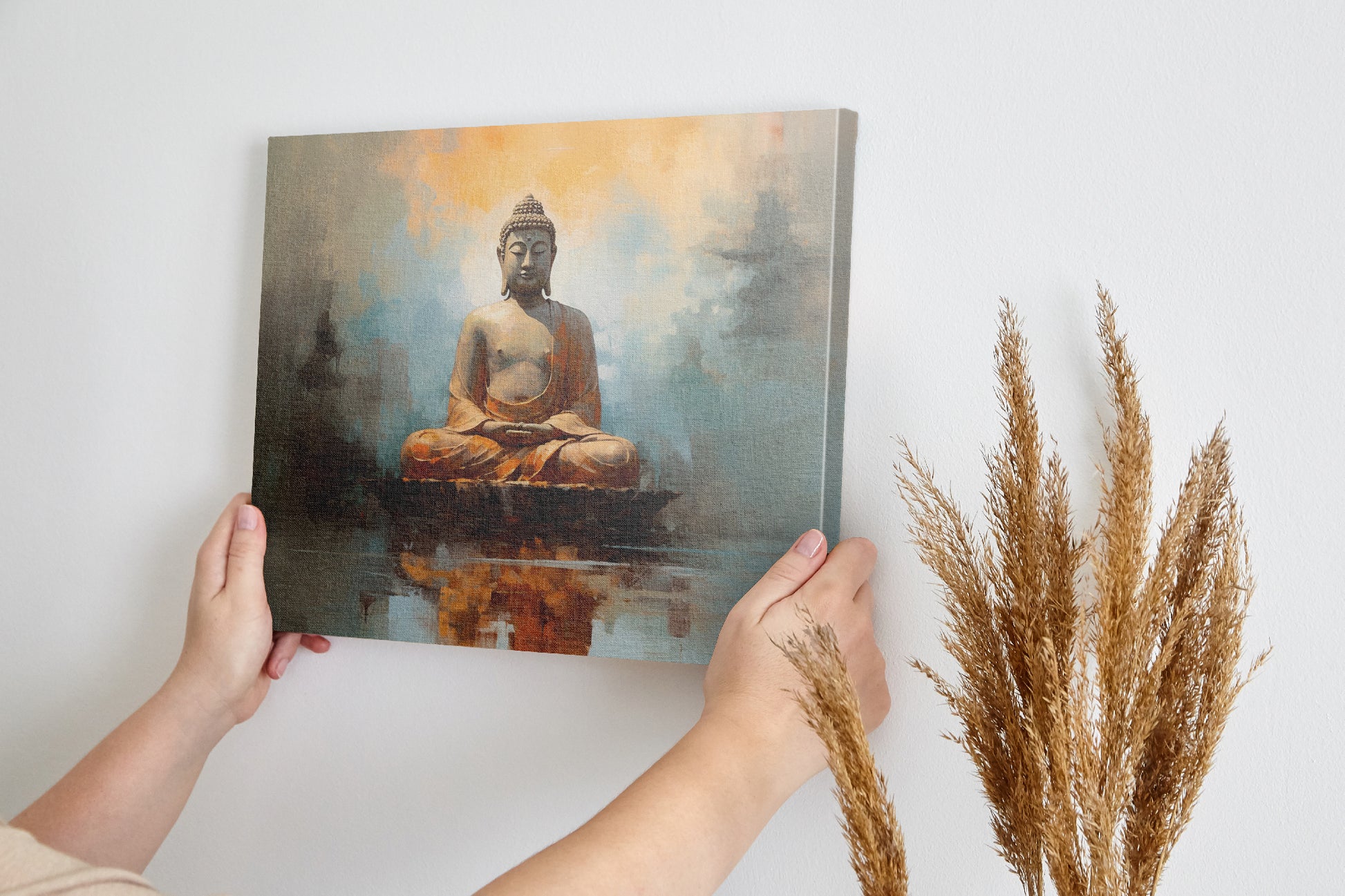 Framed canvas print of serene Buddha statue with abstract warm hues and reflective water