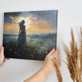 Framed canvas print of a figure in a meadow at sunset with dramatic sky and expressive brushstrokes