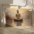 Framed canvas print of a meditative Buddha against a calming sunset and reflective water