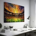 Framed canvas print of an impressionist football stadium with vibrant sunset hues