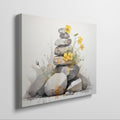 Framed canvas print of Zen stones balanced in watercolour with yellow flowers