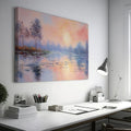 Framed canvas print of an impressionist painting depicting a serene lakeside sunrise with pastel pink and blue hues