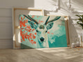 Framed canvas print of a serene stag with vibrant blue and red tones