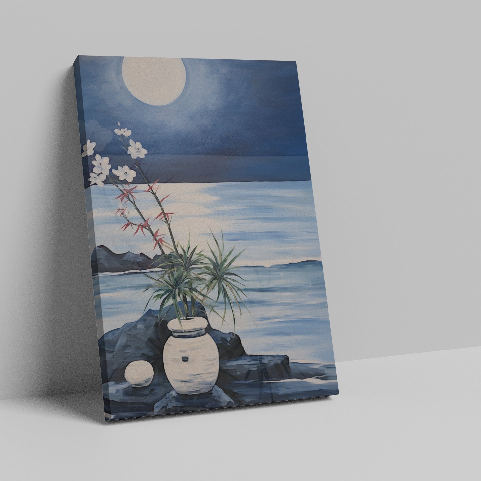 Blue and white moonlit seascape painting with flowers, rocks, and water