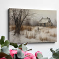 Framed canvas print of a rustic winter scene with a country home and an individual walking by