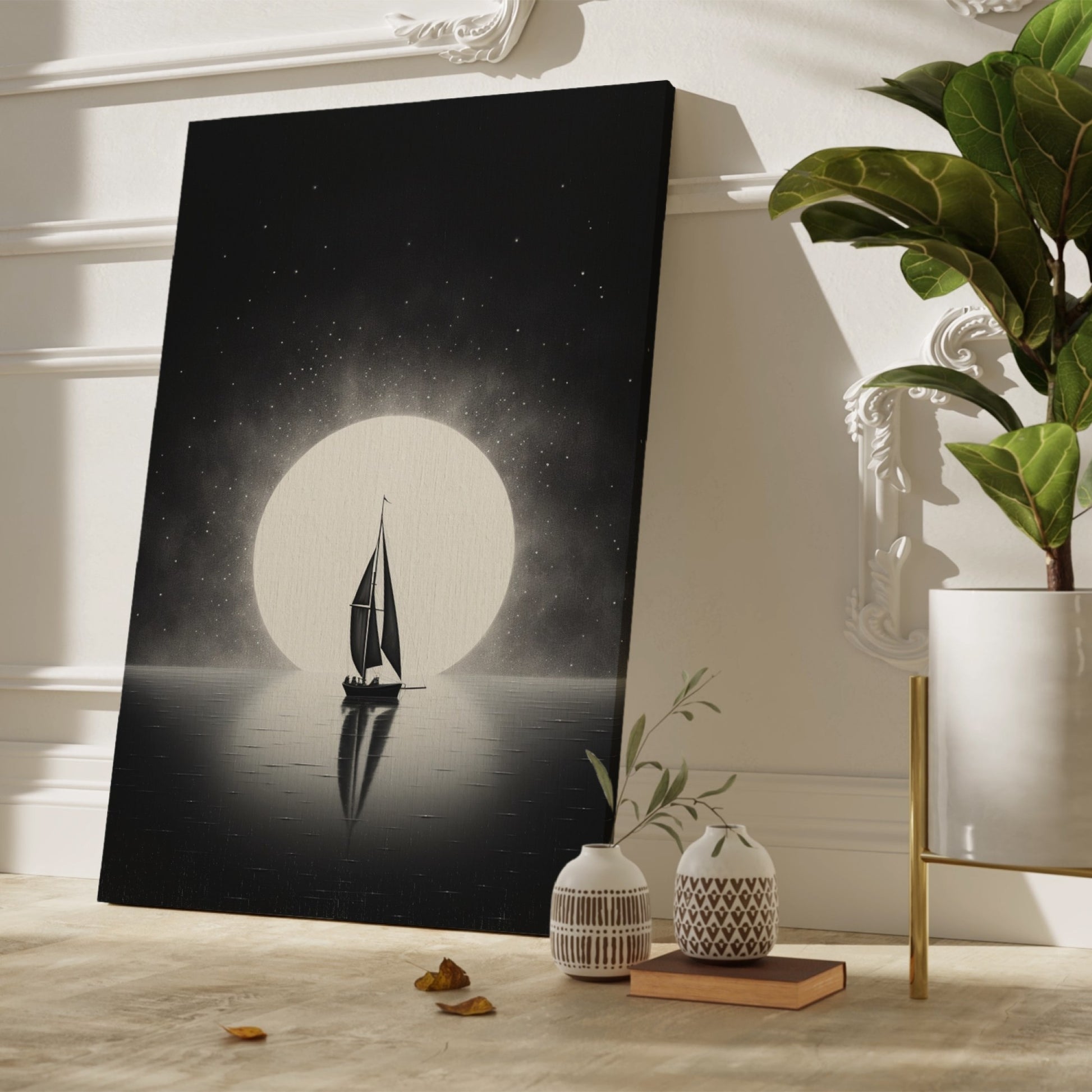 Framed canvas print of a sailboat silhouette against a full moon and starry sky