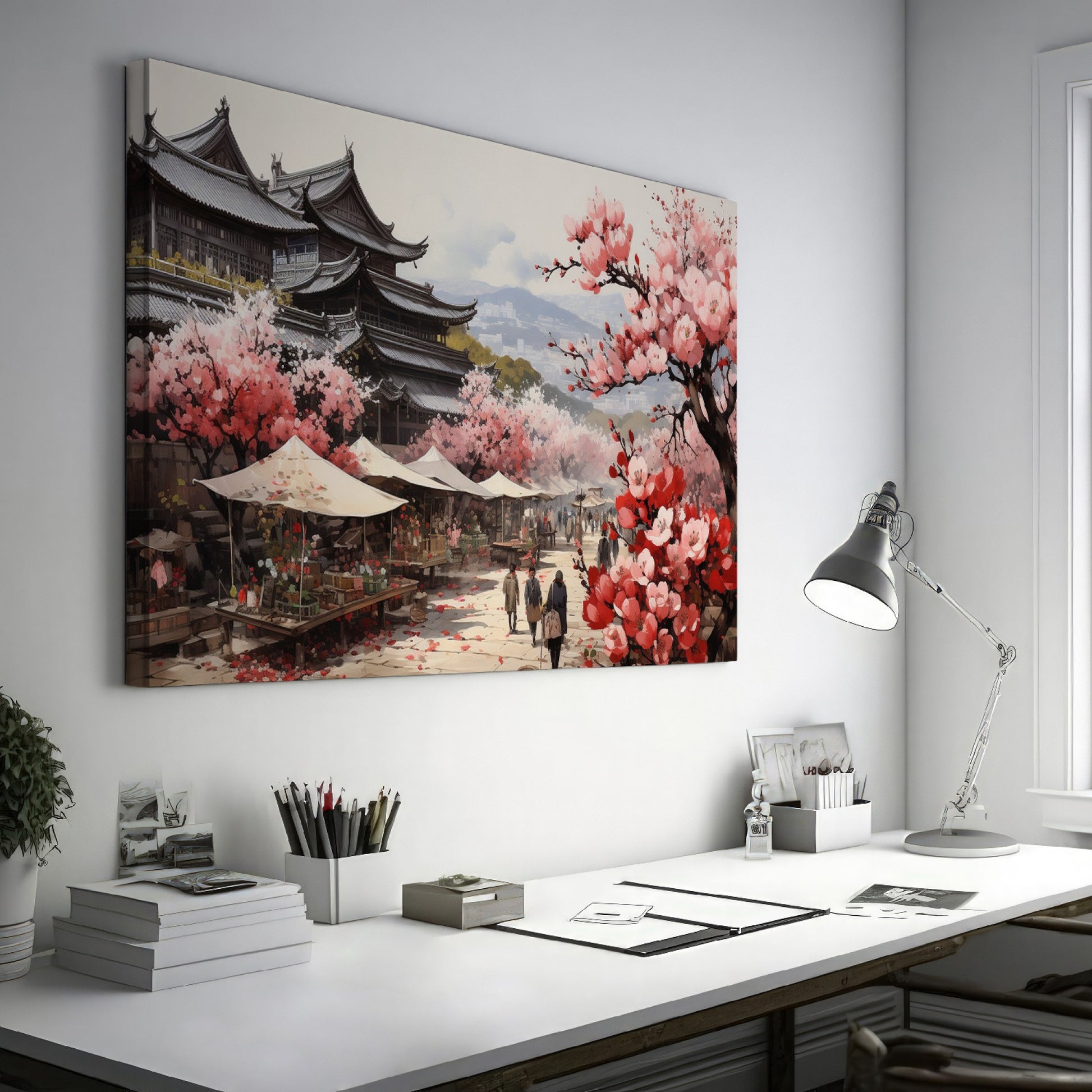 Framed canvas print of a traditional Japanese town during cherry blossom season with pink florals and historic architecture