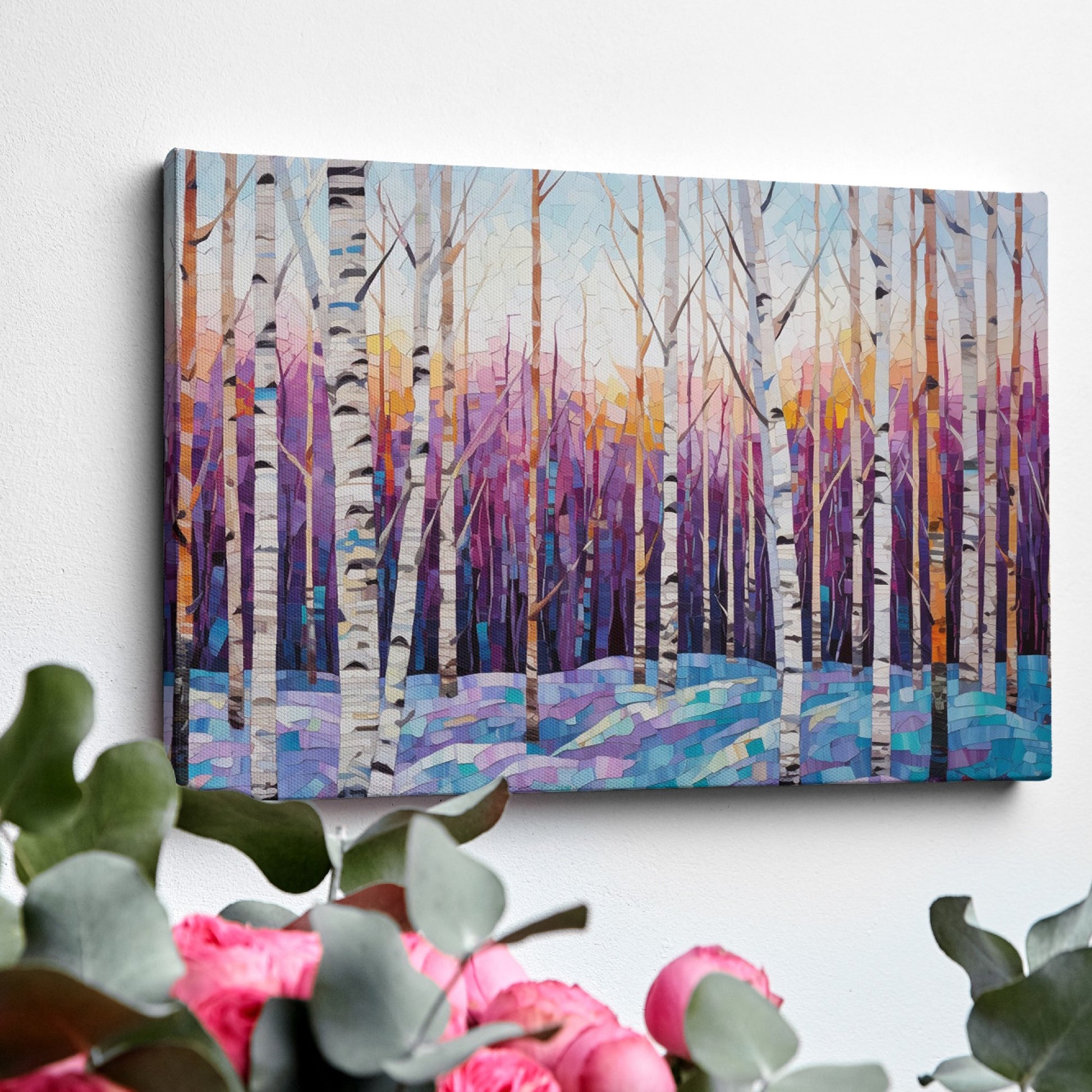 Framed canvas print of a vibrant geometric mosaic depicting an abstract birch forest with coloured leaves and sunset backdrop