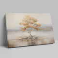 Framed canvas print of a solitary tree with autumn leaves reflected on a calm lake with warm beige, gold, and white tones