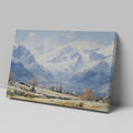 Framed canvas print of an impressionist painting featuring a snowy mountain landscape with an alpine village