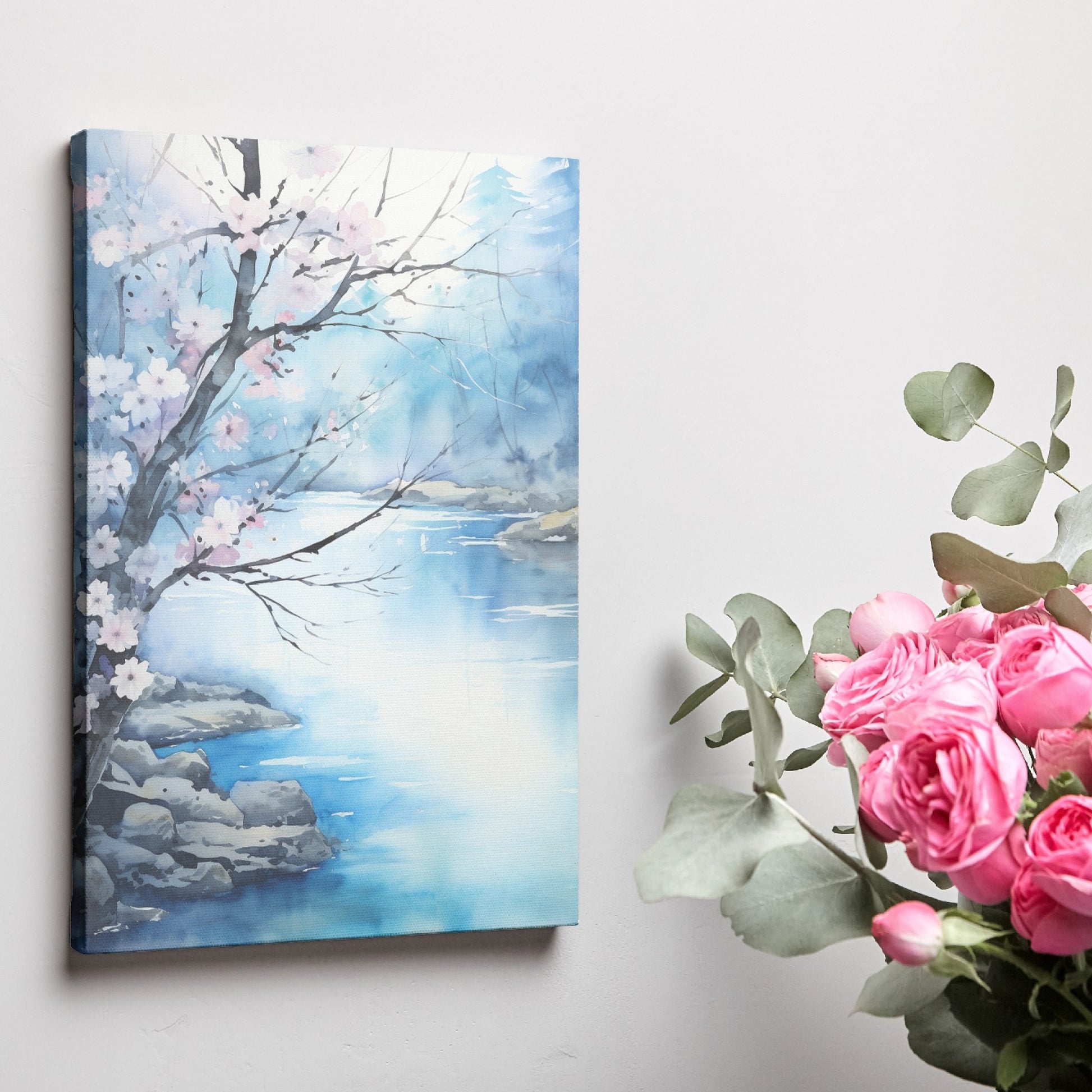 Framed canvas print of a serene watercolour landscape with cherry blossom and tranquil river