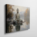 Framed canvas print of a serene Buddha in meditation with a reflective water landscape and autumnal trees