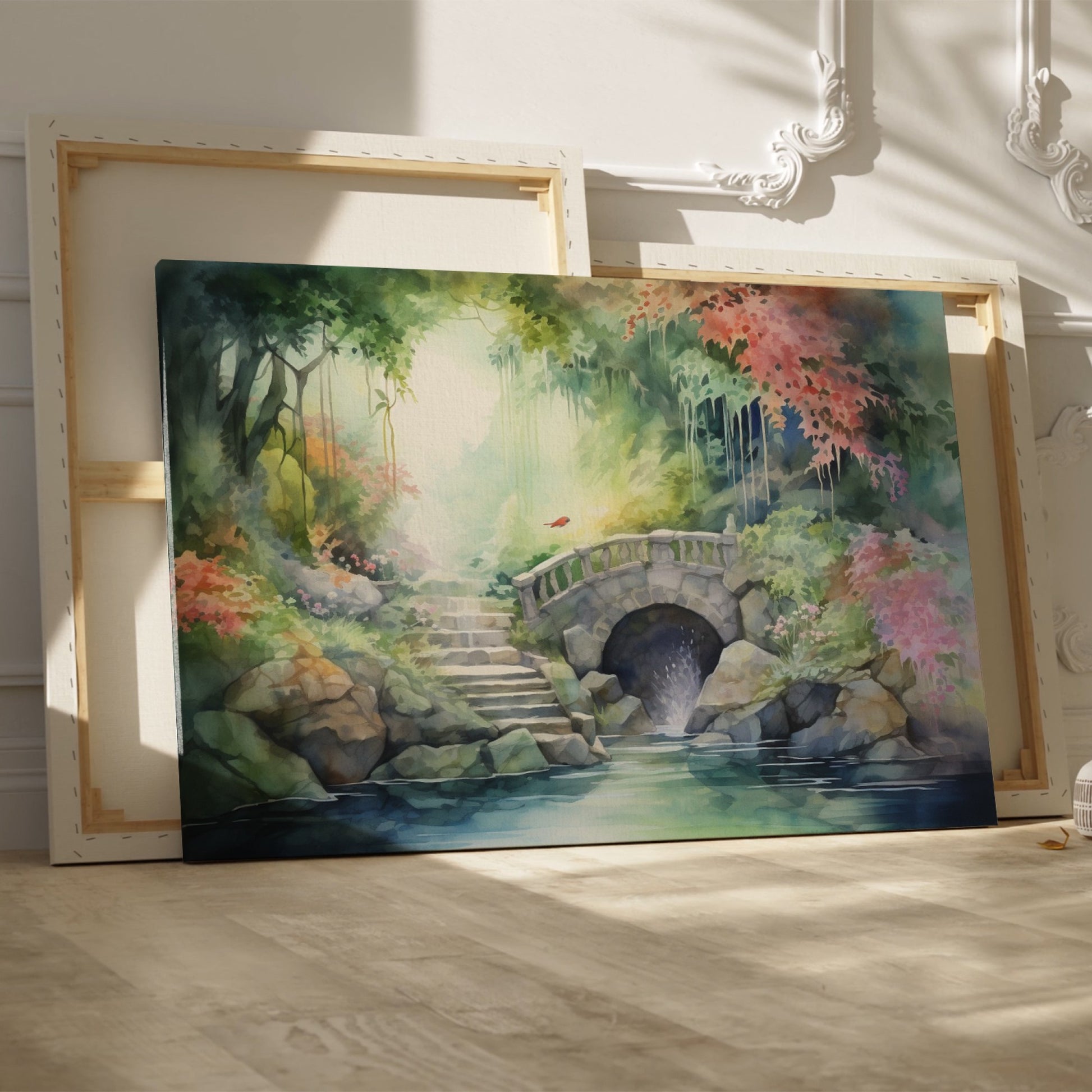 Framed canvas print of a tranquil watercolour garden with a stone bridge and flowing stream surrounded by colourful foliage