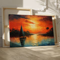 Framed canvas print of a vibrant impressionist sailboat against an orange hued sunset