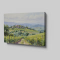 Framed canvas print of a Tuscan countryside panorama with a vineyard and rolling hills in watercolor style