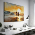 Framed canvas print of romantic couple silhouetted against a vibrant beach sunset