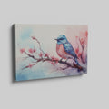 Framed canvas print of a vibrant bluebird on cherry blossom branch in watercolor