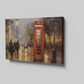 Framed canvas print of an impressionistic painting of a rainy London street with a red telephone box