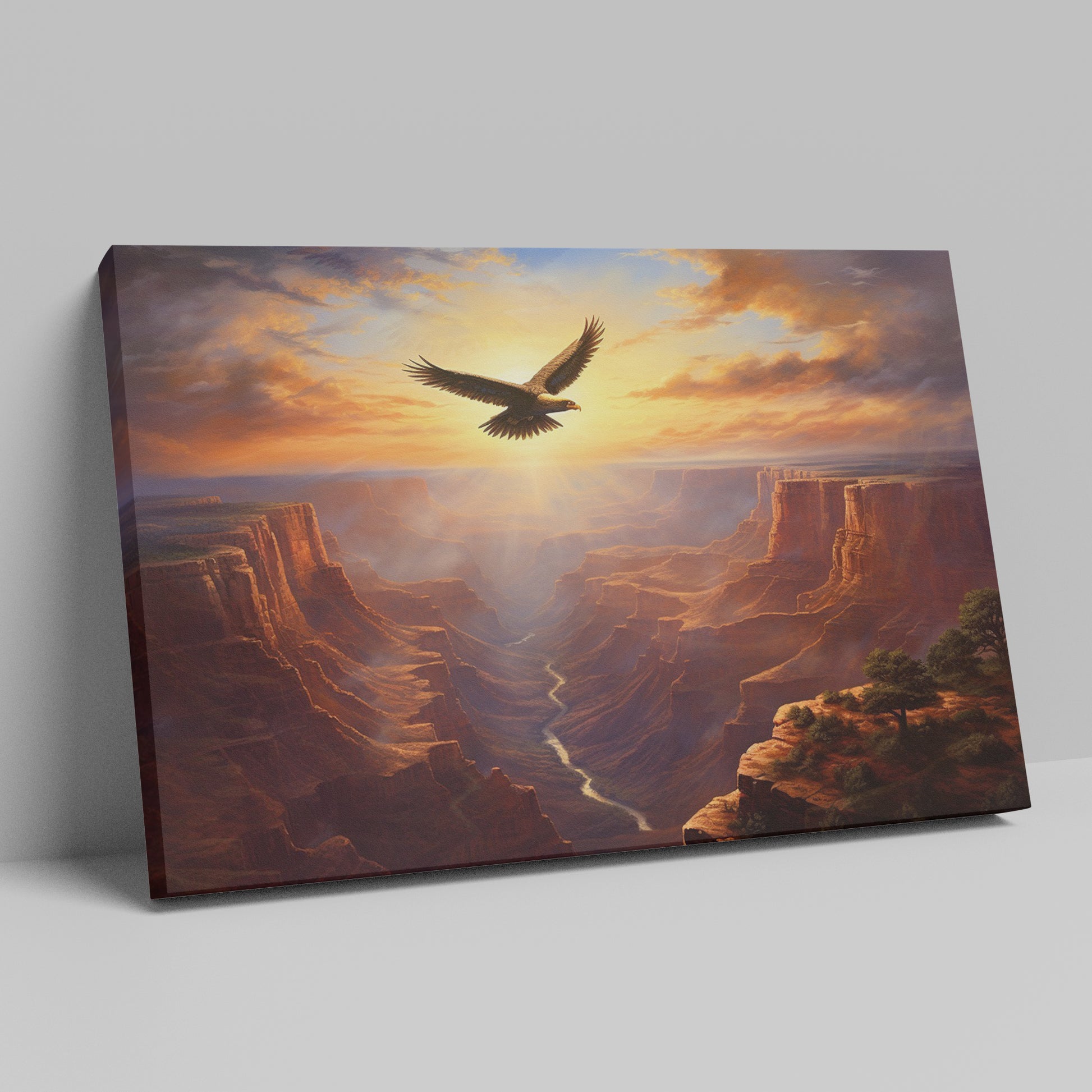 Framed canvas print of a majestic eagle flying over a grand canyon at sunrise with radiant warm colours