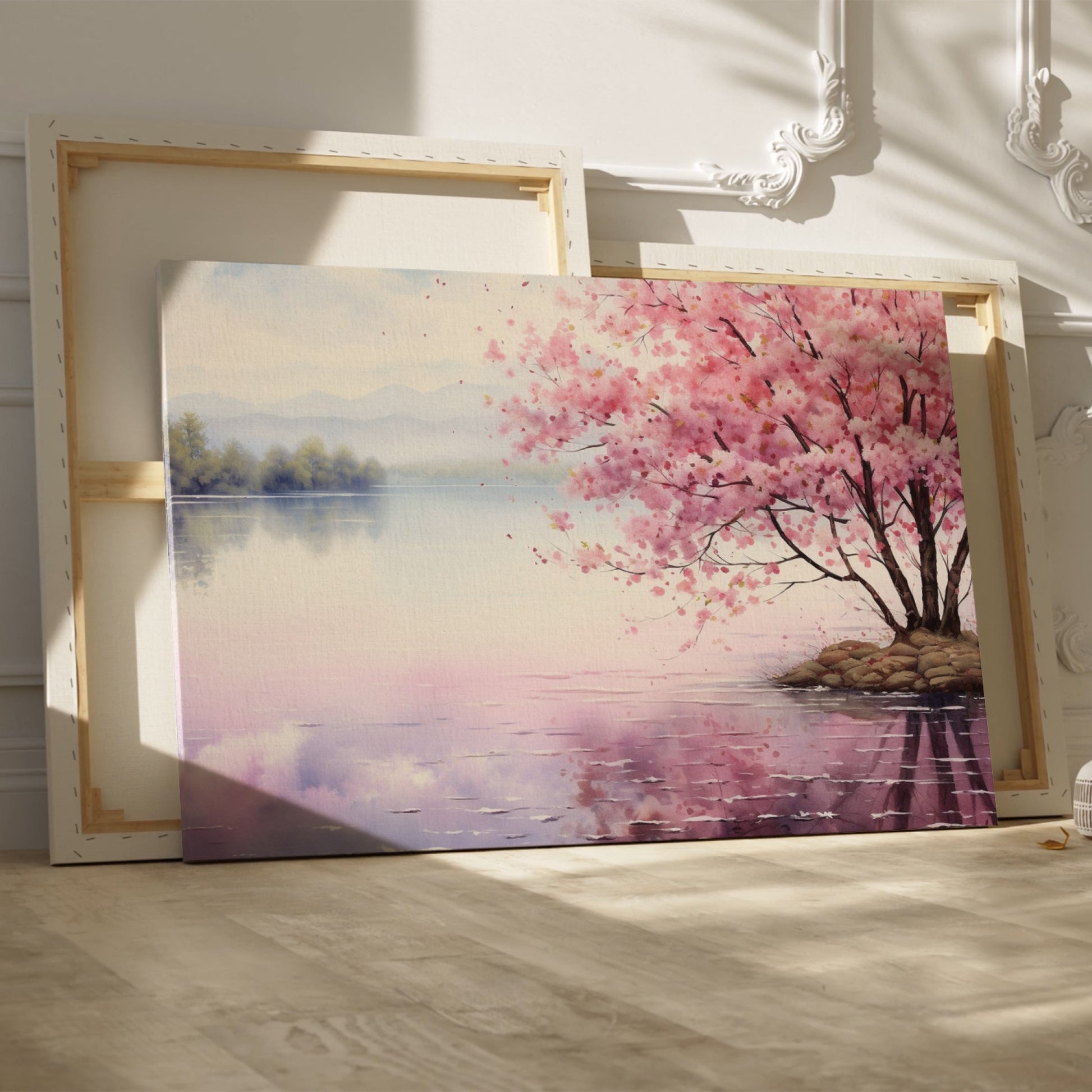 Framed canvas print of a serene cherry blossom tree by a quiet lake with pink and purple reflections