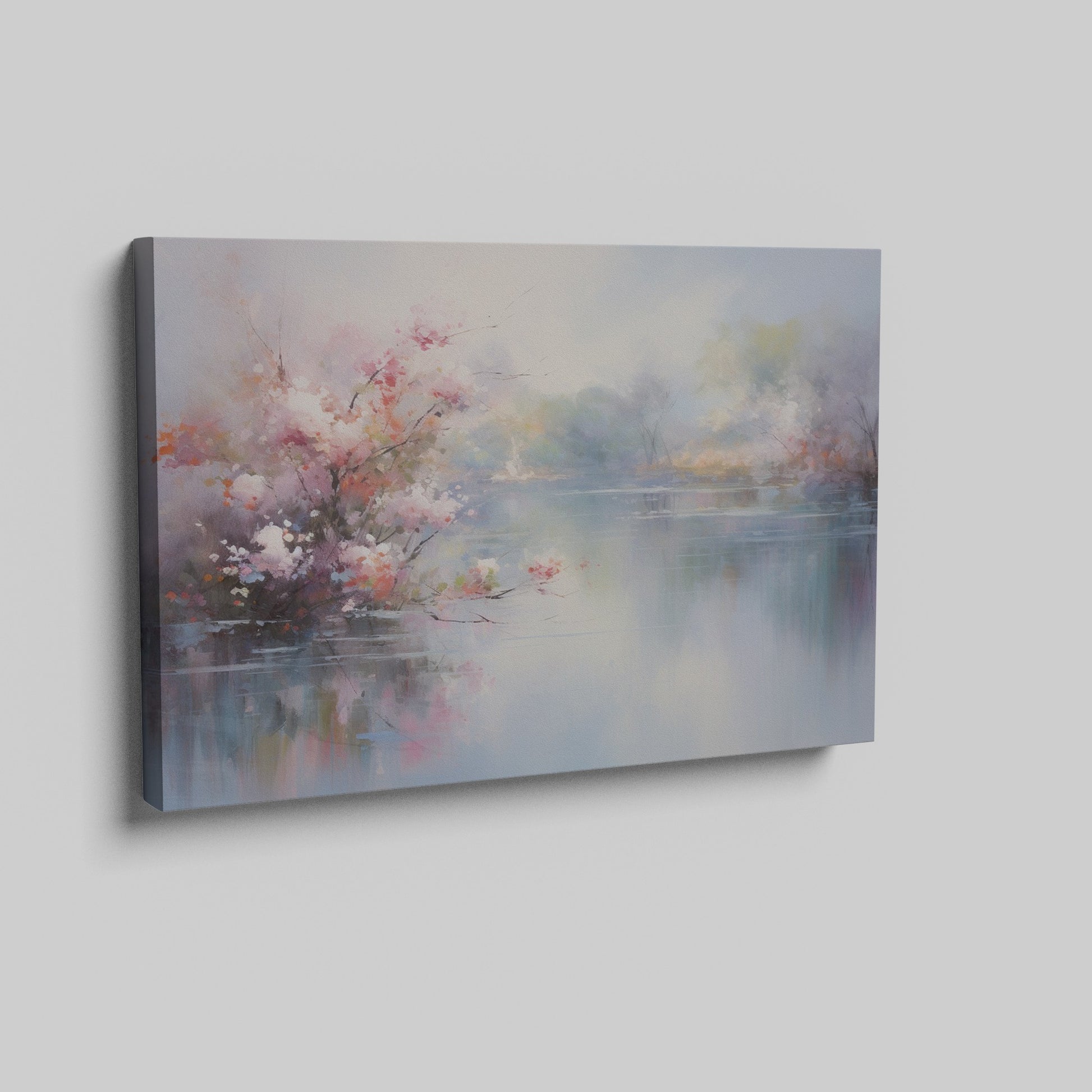 Framed canvas print depicting impressionist art of blossoming trees by a misty lake with soft pastel colours