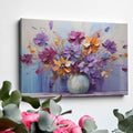 Framed canvas print of a bold textured floral painting with vibrant purple, blue, and orange flowers in an abstract vase