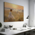 Framed canvas print of a woman in a white dress gazing at a misty sunrise over a golden field