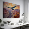 Framed canvas print of a majestic eagle flying over a dramatic canyon landscape at sunset