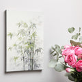 Framed canvas print of stylised bamboo stalks in tranquil shades of green and grey